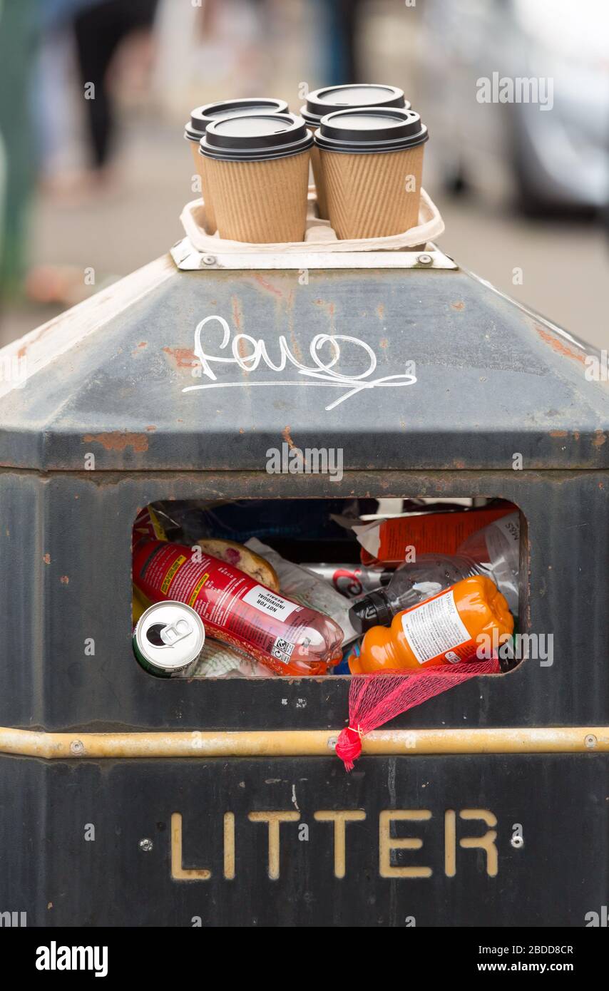 Garbage can overflowing plastic bottles hires stock photography and