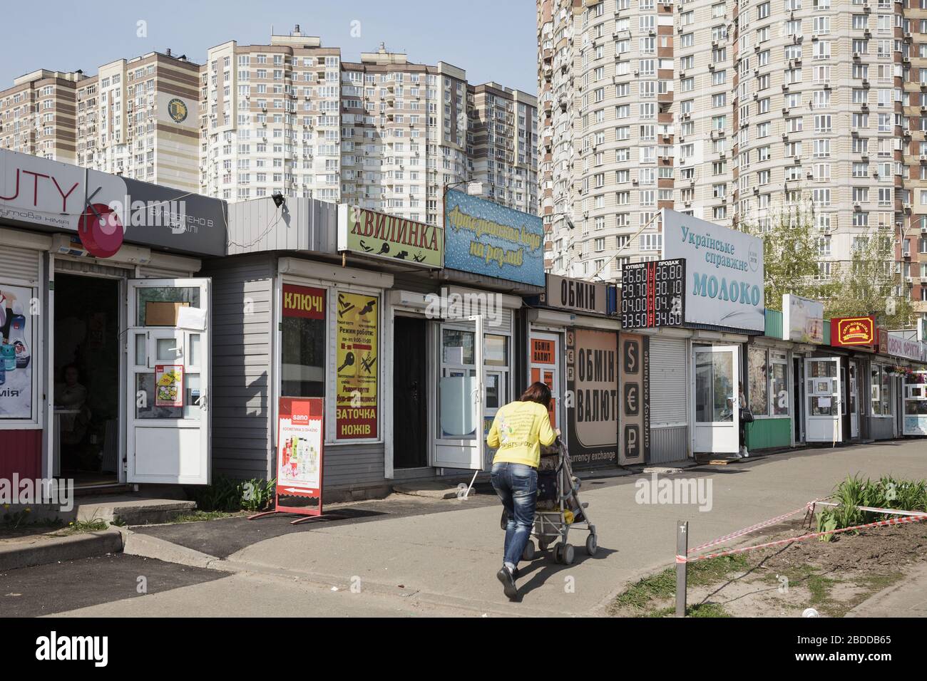 25.04.2019, Kiew, , Ukraine - Row of shops in a high-rise housing estate in the Darnyzja rayon in Kiev. 00P190425D646CAROEX.JPG [MODEL RELEASE: NOT AP Stock Photo