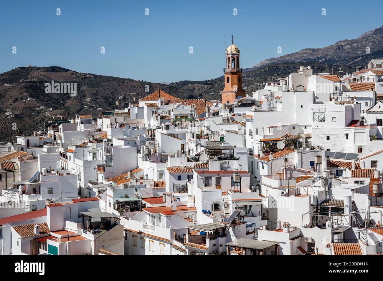 27.02.2020, Competa, Malaga, Spain - The white mountain village Competa in the Axarqu’a district of the province of Malaga is a popular tourist destin Stock Photo