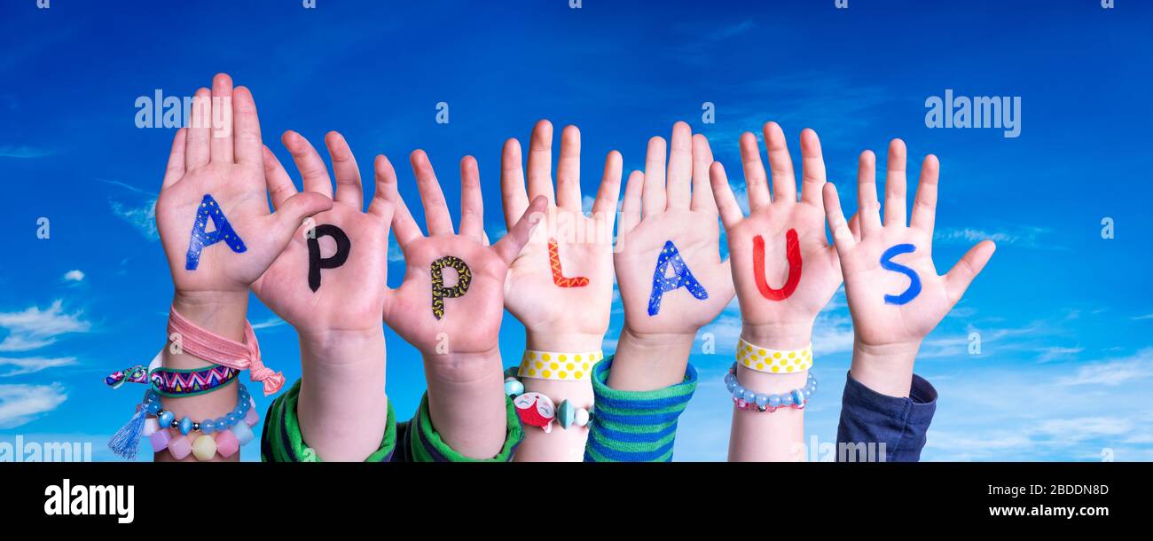 Children Hands Building Word Applaus Means Applause, Blue Sky Stock Photo