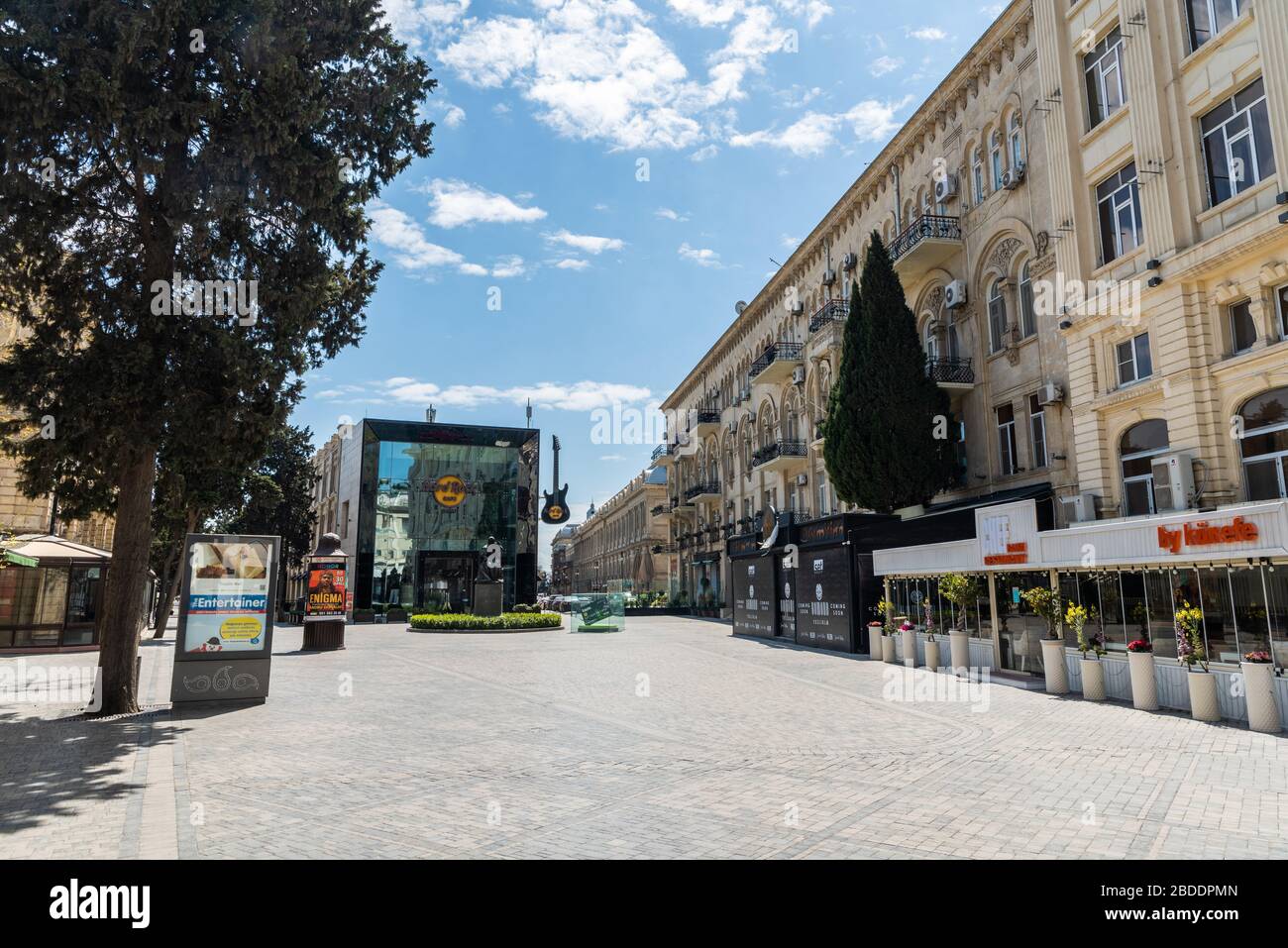 Baku, Azerbaijan – April 8, 2020. View of deserted Mammadamin Rasulzada street in Baku, toward Azerbaijan Cinema and Natavan Monument,in the wake of q Stock Photo