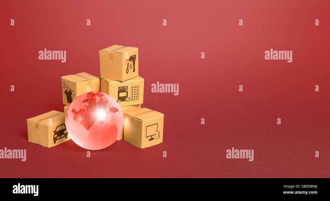 Red glass globe and cardboard boxes. Delivery of goods, shipping. Global economy, import export freight traffic. Globalization markets. Economics deve Stock Photo