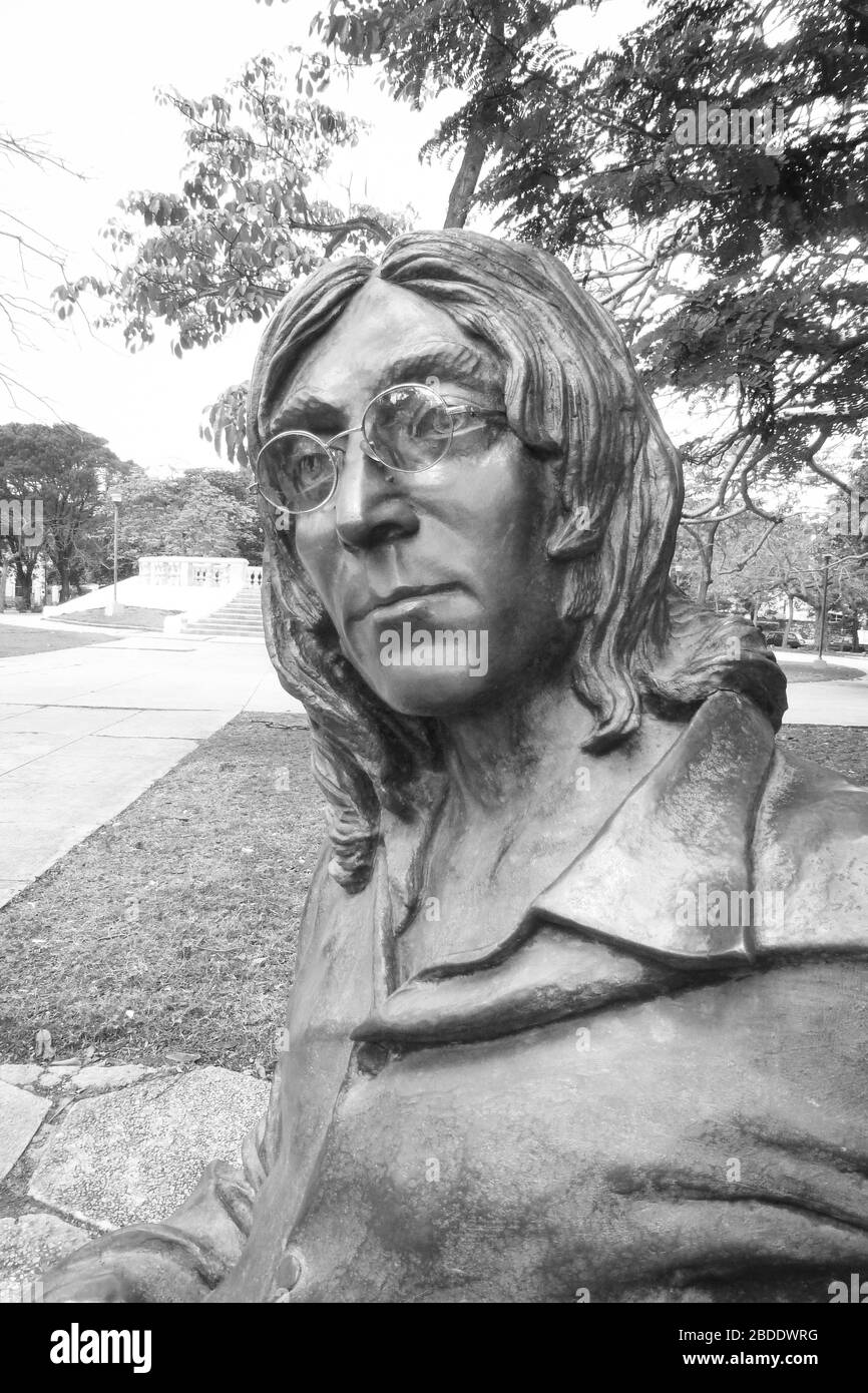 John Lennon one of the beetles with glasses in a park Havana Cuba face metal fabricated park fame singer sing songs killed dead murdered new York Stock Photo