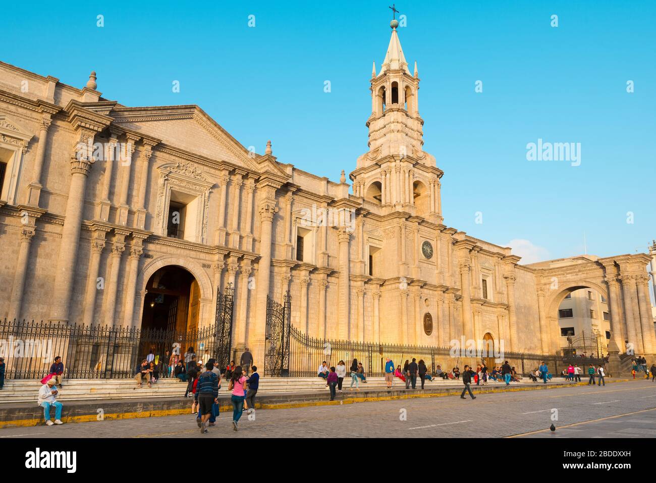 Arequipa, Provincia de Arequipa, Peru - People outside the cathedral Catedral basilica de Arequipa at the main square. Stock Photo