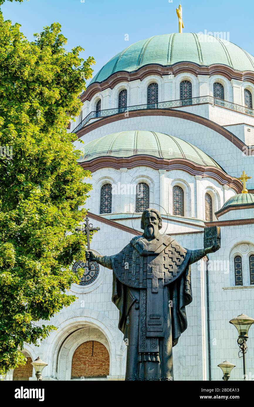 Statue of Saint Sava outside the huge orthodox church in his name,  built in the 20th century in Byzantine-revival style. Belgrade, Serbia. May 2017. Stock Photo