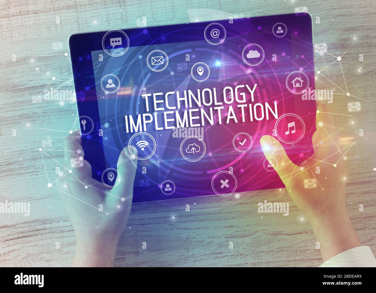 Inscription Technology Close-up of a tablet with TECHNOLOGY IMPLEMENTATION inscription ...