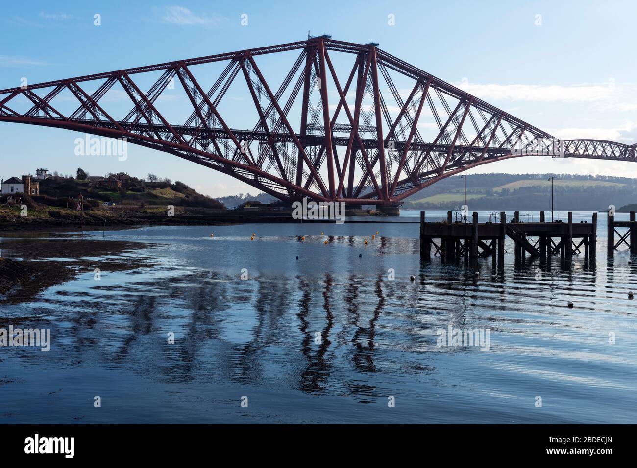 Forth Rail Bridge viewed from the harbour on South Bay, North Queensferry in Fife, Scotland, UK Stock Photo