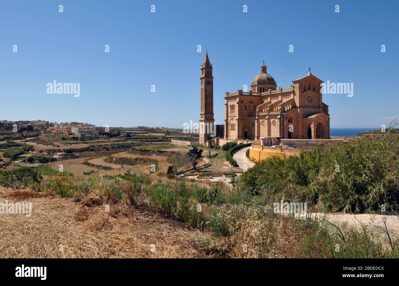 The Ta' Pinu National Shrine at Gharb on the island of Gozo, Malta, is a popular destination for tourists and pilgrims, and was consecrated in 1932. Stock Photo