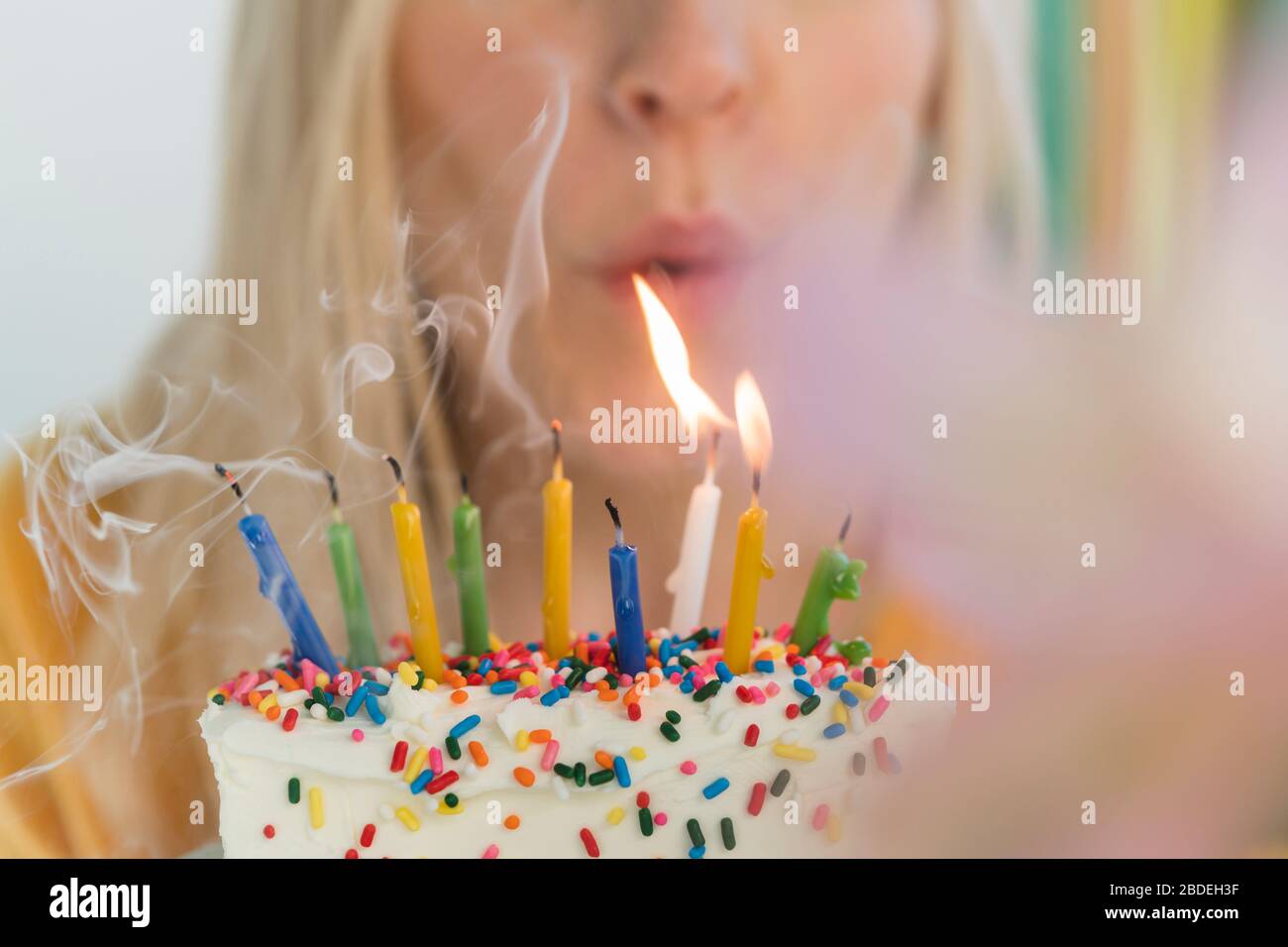 Woman blowing candles birthday hires stock photography and images Alamy