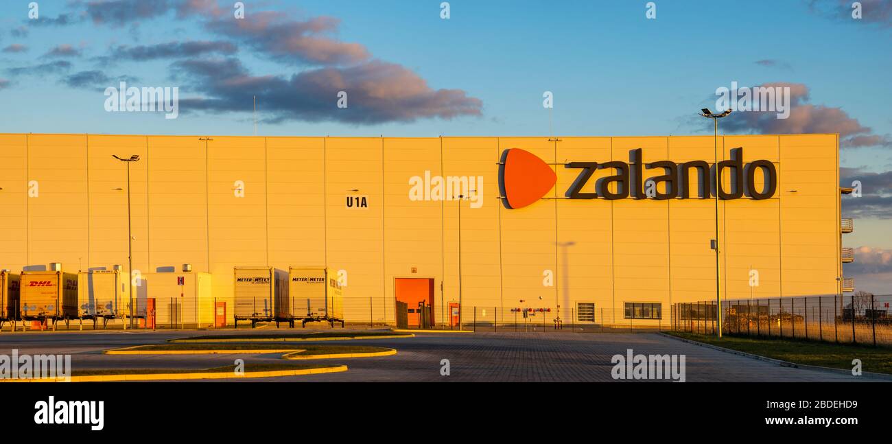 Modern storage building at Zalando logistics center in Poland in the light  of the setting sun Stock Photo - Alamy