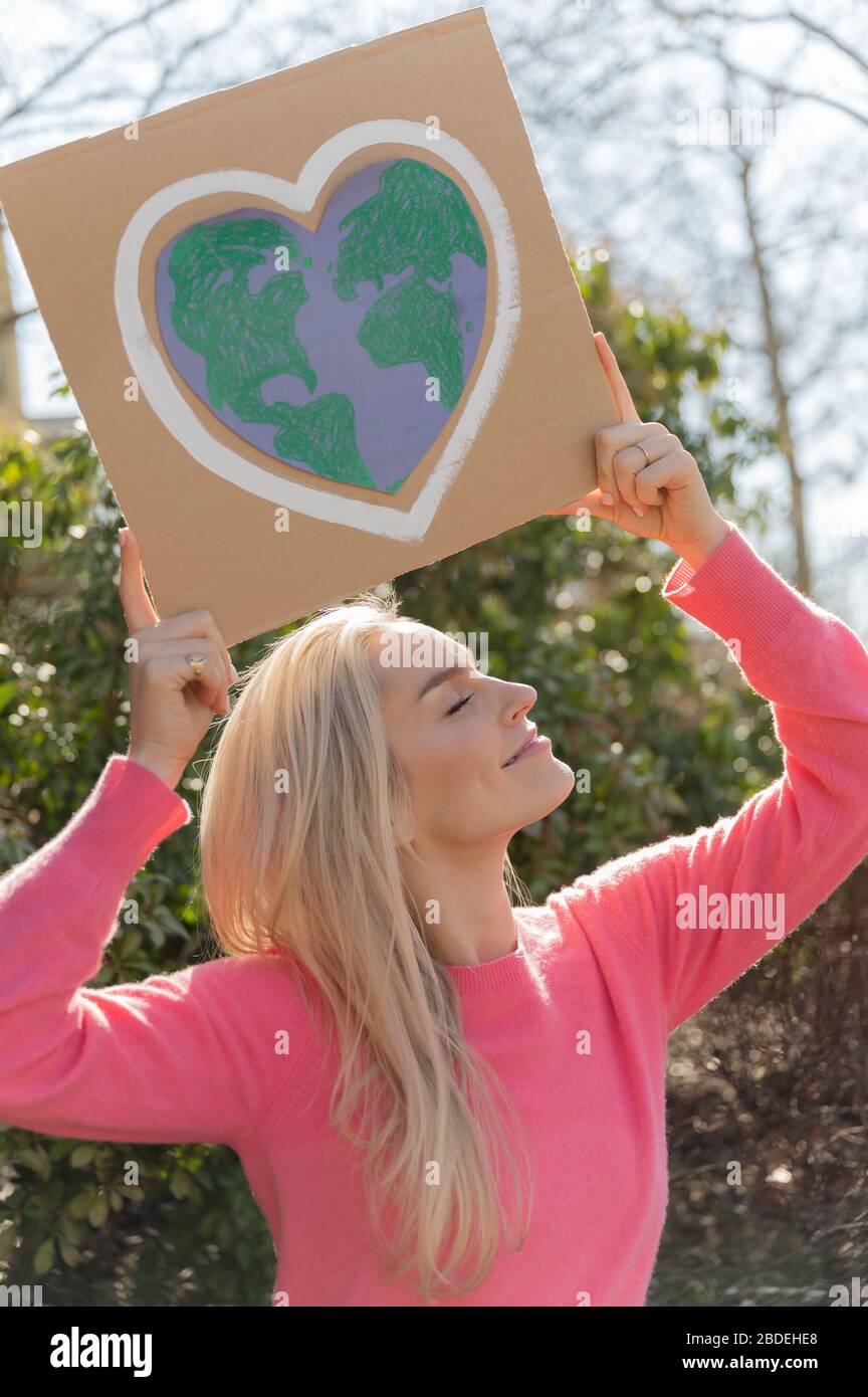 Woman protesting climate change Stock Photo