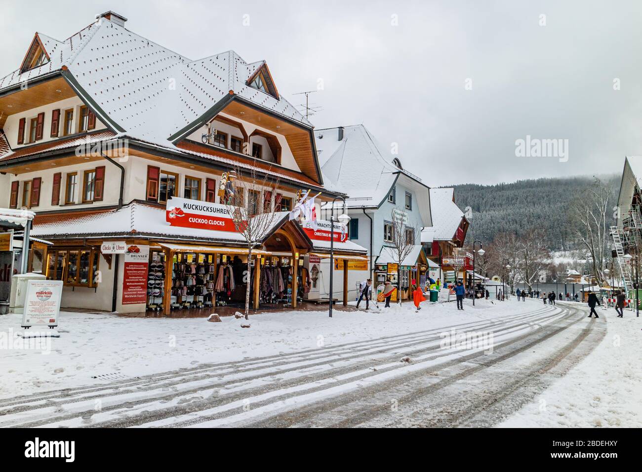 Souvenir shops in the town of Titisee in snowy weather, in the Schwarzwald / Black Forest region of Germany. February 2020. Stock Photo