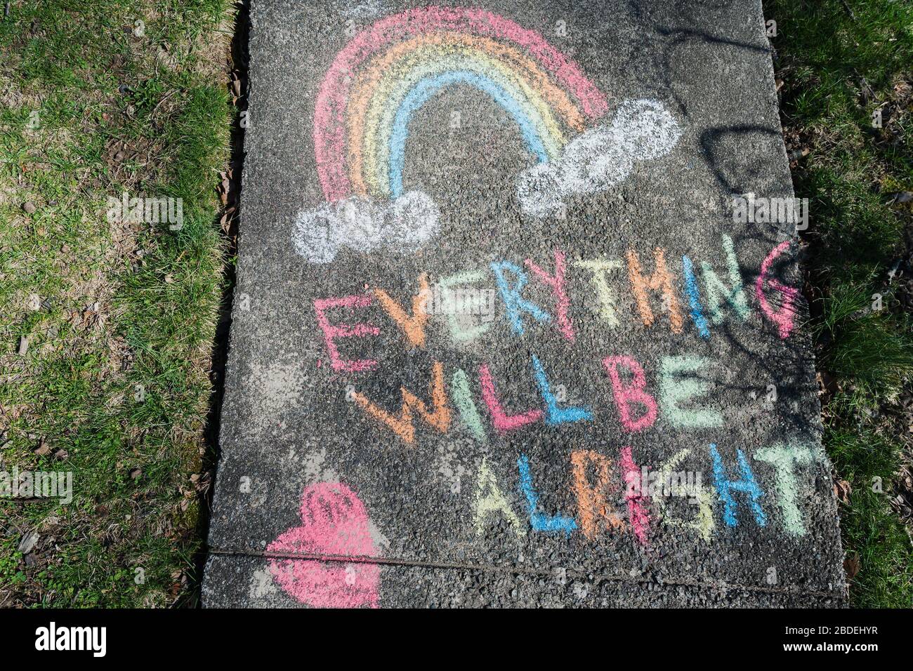 Hopeful message written on sidewalk in chalk during Covid 19 pandemic Stock Photo