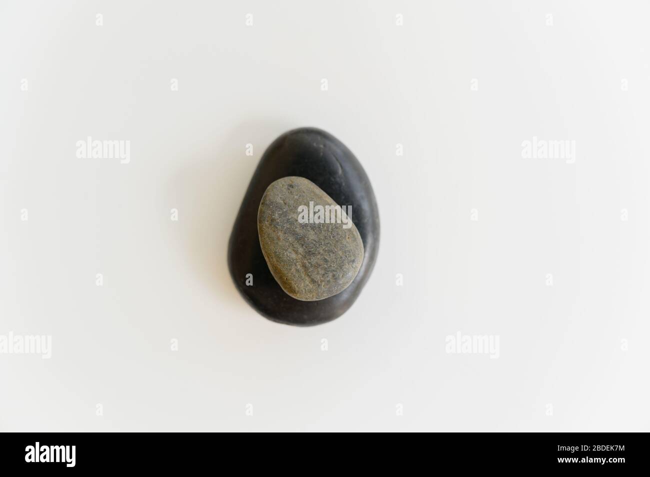 Composition of two stones on white background Stock Photo