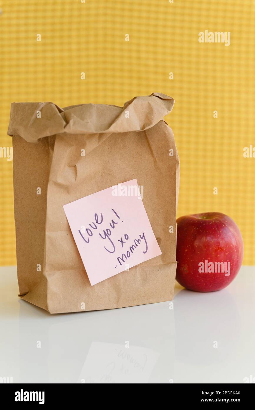School lunch in paper bag with note from momÂ Stock Photo