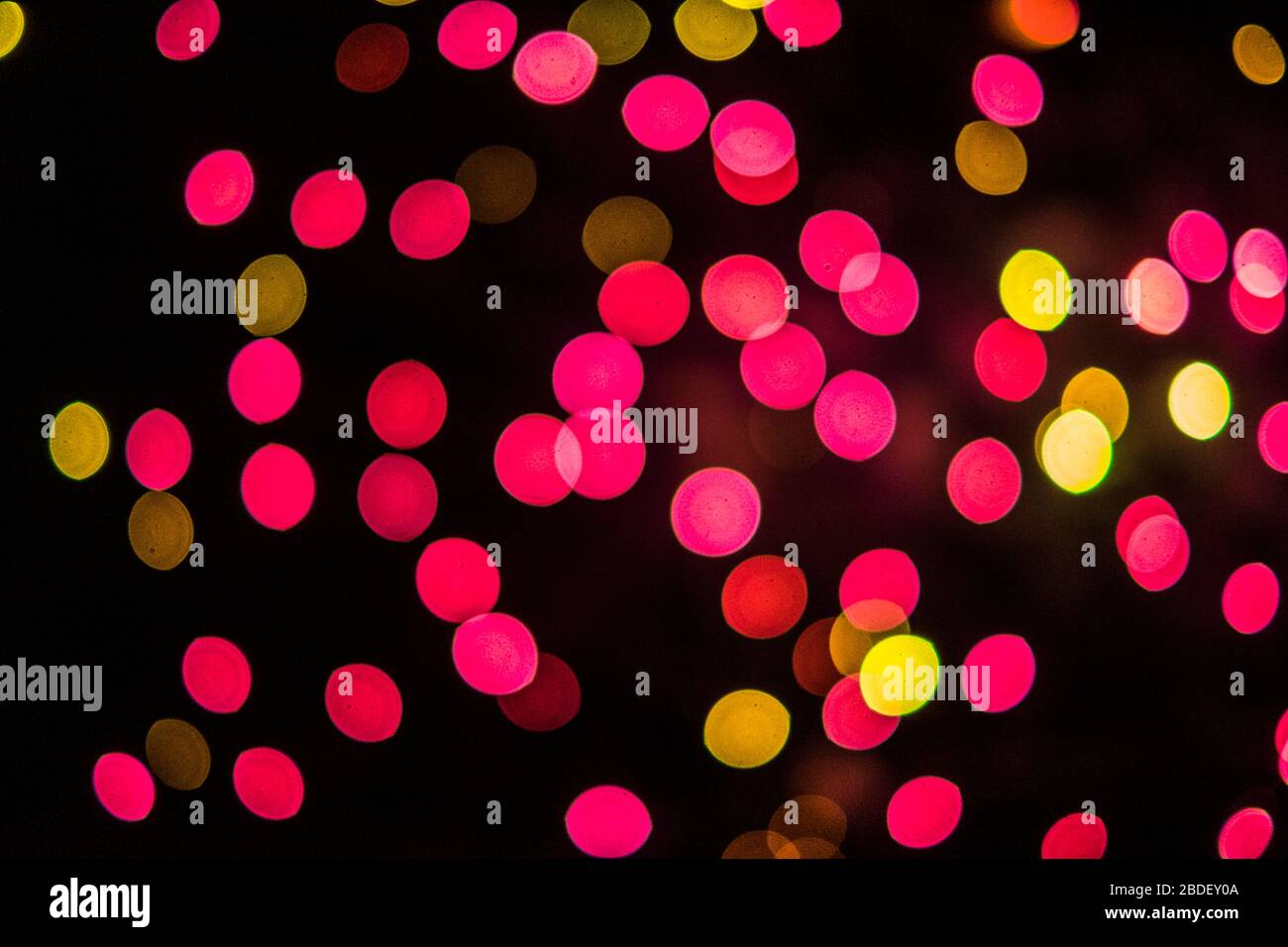 Colorful bokeh on black background Stock Photo - Alamy