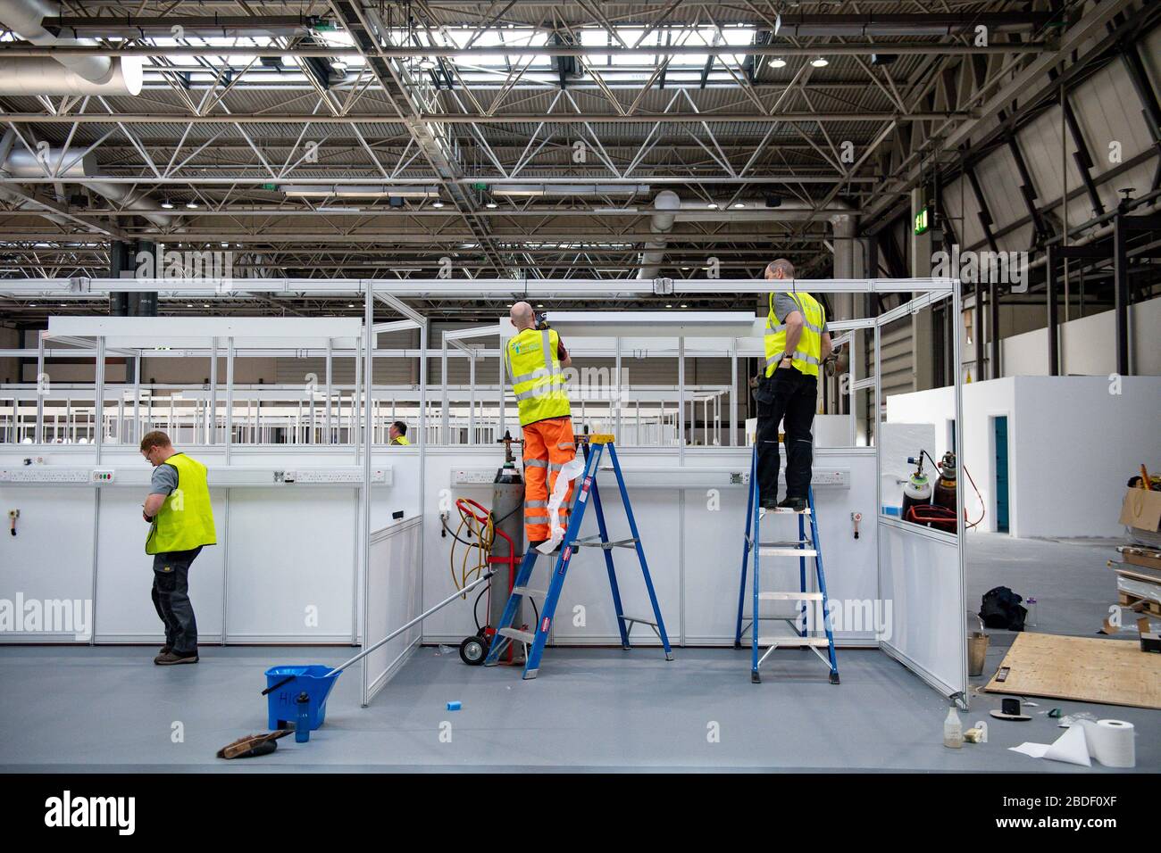 Work continues at the new temporary NHS Nightingale Birmingham Hospital at the NEC in Birmingham, which is being built to provide care for an increased number of patients requiring treatment during the COVID-19 pandemic. Stock Photo