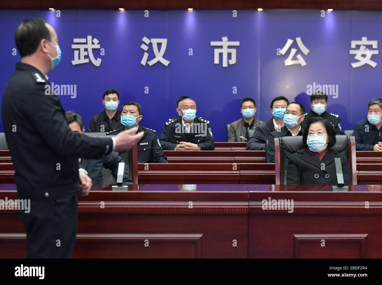 Wuhan, China. 08th Apr, 2020. Chinese Vice Premier Sun Chunlan, also a member of the Political Bureau of the Communist Party of China Central Committee, learns about the removal of traffic control checkpoints and measures for tracing outbound travelers via video connections at the command center of the Wuhan Public Security Bureau in Wuhan, central China's Hubei Province, April 8, 2020. Sun, who is leading a central government group to oversee the COVID-19 epidemic control work in Hubei, on Wednesday conducted an on-site inspection on the lifting of outbound transportation restr Credit: Xinhua Stock Photo