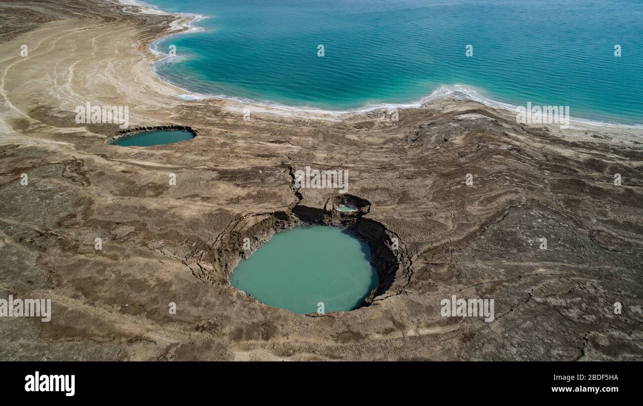 Aerial view of Sinkholes near the Dead Sea,Israel Stock Photo