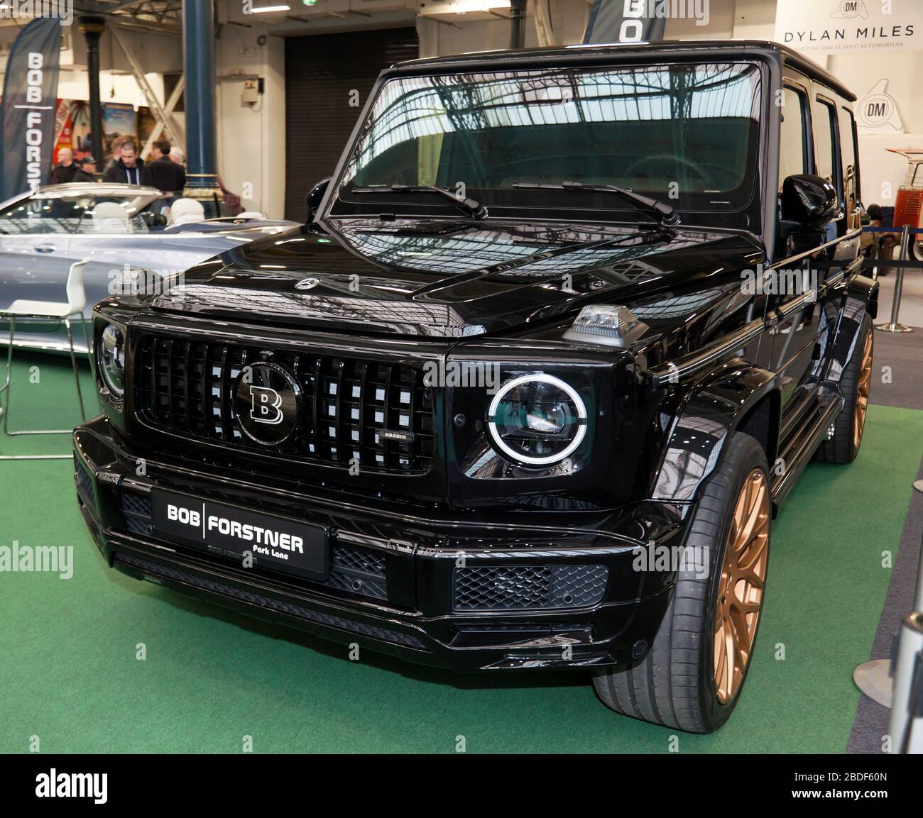 Three-Quarters Front View of a 2020, Brabus powered G350D AMG LHD, on display at the Bob Forstner Stand, of the 2020 London Classic Car Show Stock Photo