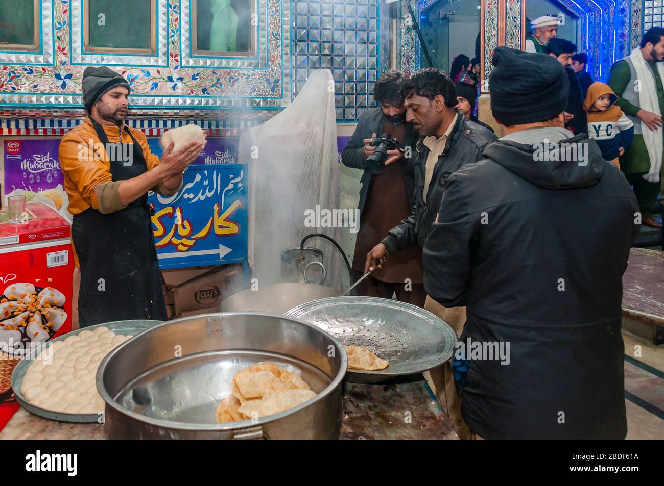 Man use whole wheat flour, the poori dough is made into small balls