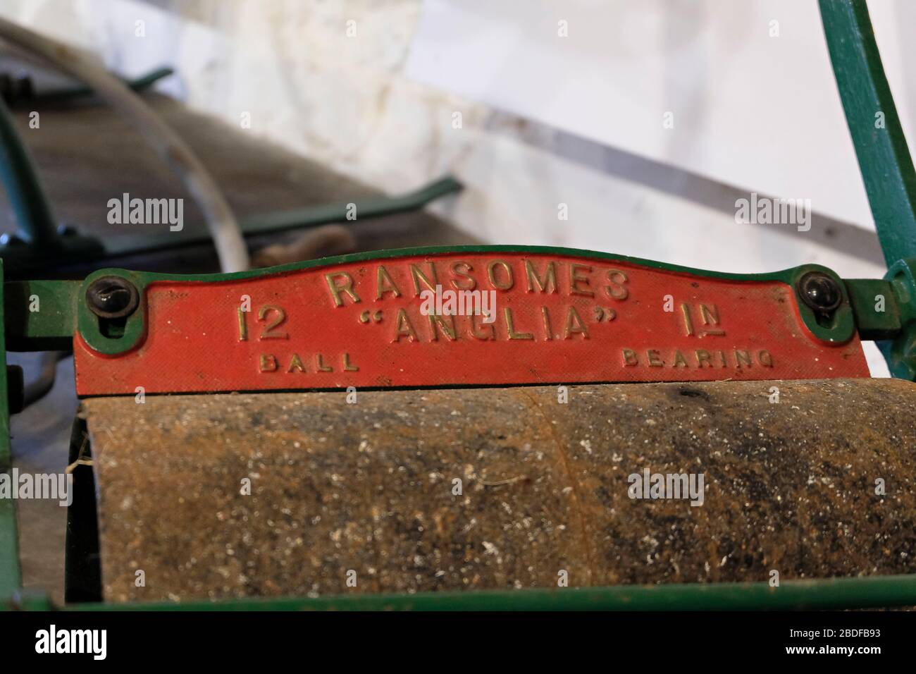 A close up of a vintage Ransomes 'Anglia' hand lawnmower Stock Photo
