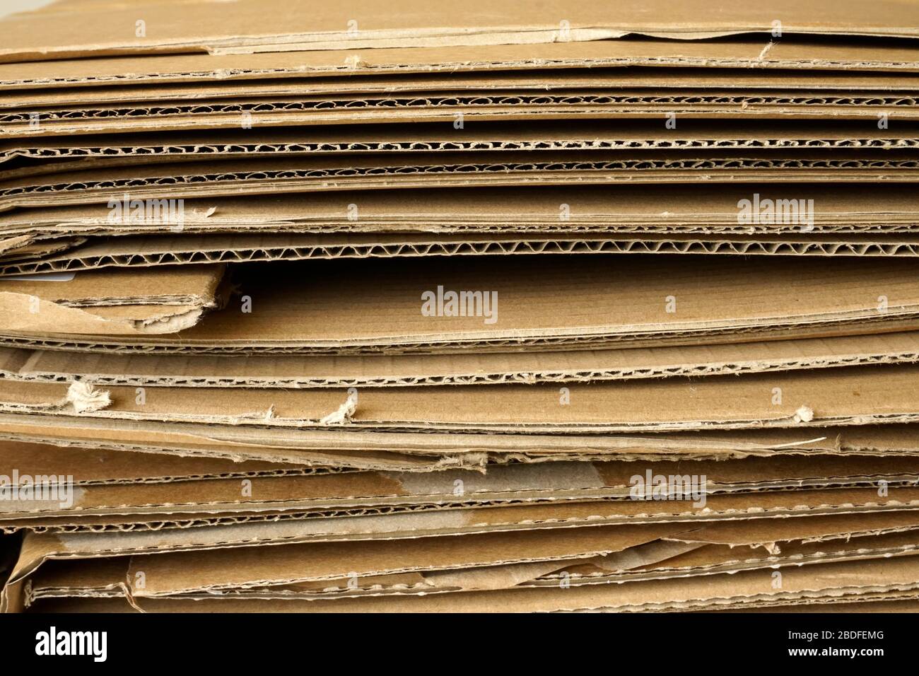 Sheets of brown corrugated cardboard stacked. Packaging material Stock