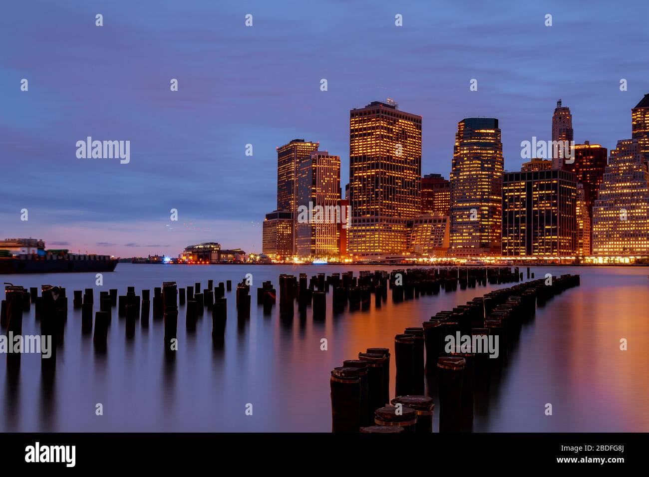 Downtown New York City Manhattan with skyline at dusk illuminated Stock ...