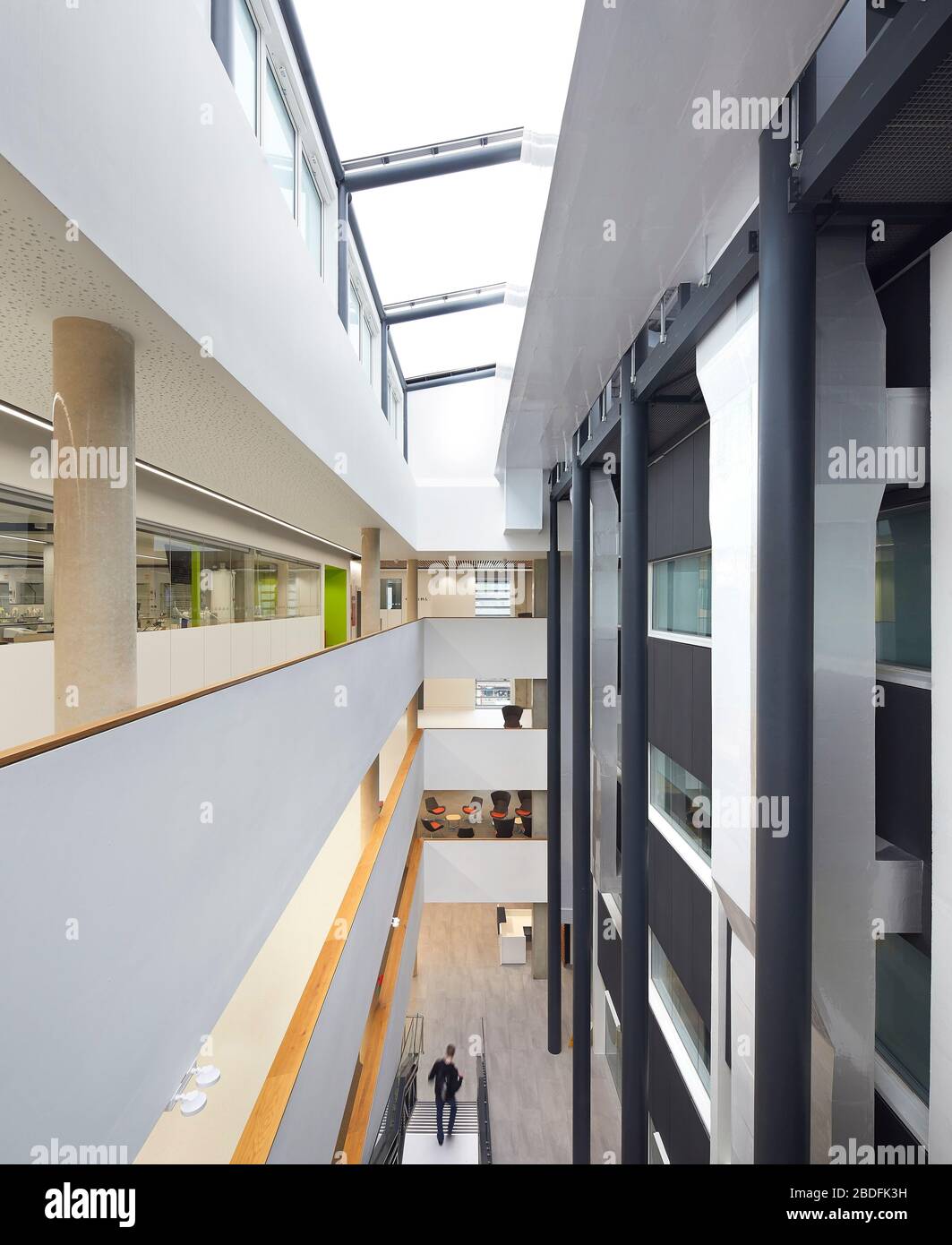 Raised view across full-height atrium. STEM Building - University of Bedforshire, Luton, United Kingdom. Architect: MCW, 2019. Stock Photo