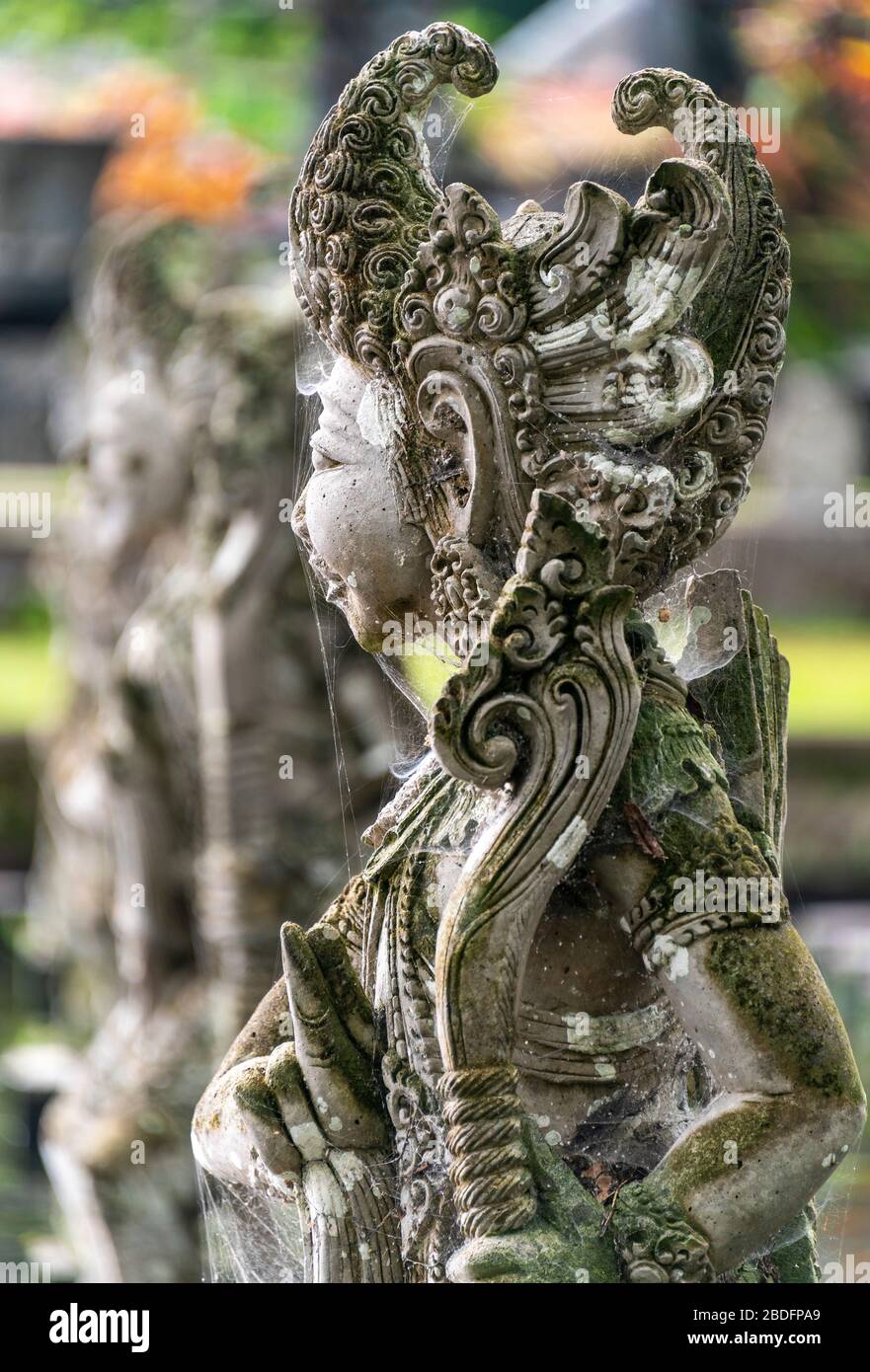Vertical view of a beautiful statue in the water palace gardens in Bali, Indonesia. Stock Photo