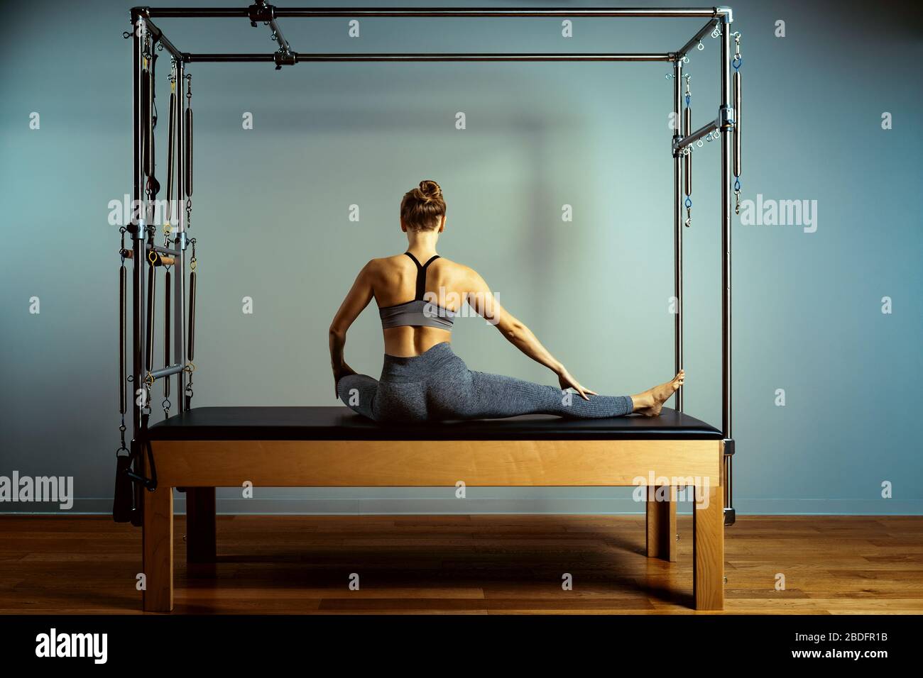 leotard workout pilates training. athletic pilates reformer exercises