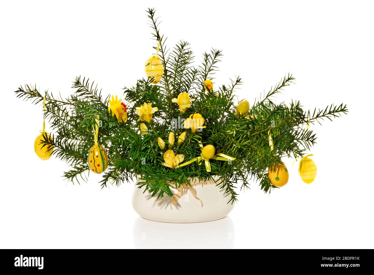 aster decoration with Easter eggs and yew branches Stock Photo