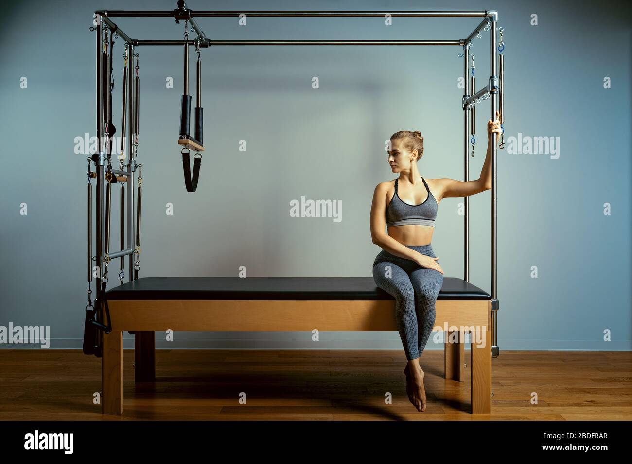 leotard workout pilates training. athletic pilates reformer exercises