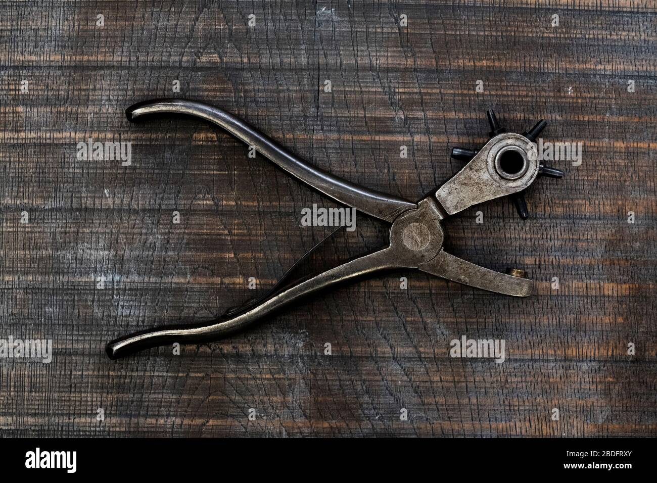 Hole punch tool hi-res stock photography and images - Alamy
