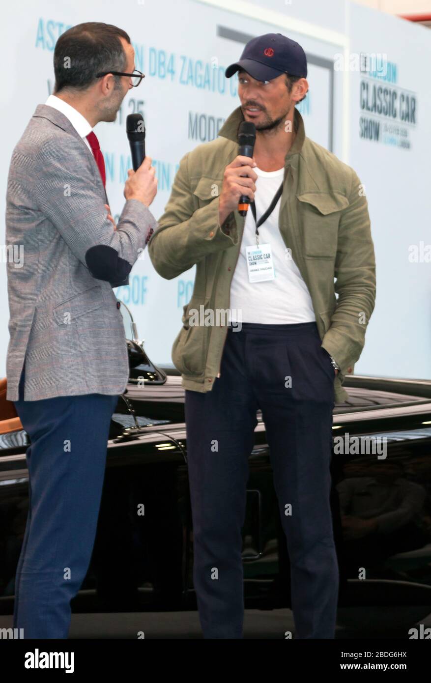 David Gandy discussing his recently restored 1954, Jaguar XK120, with Max Girardo, on the Car Stories Stage, at the 2020  London Classic Car Show Stock Photo