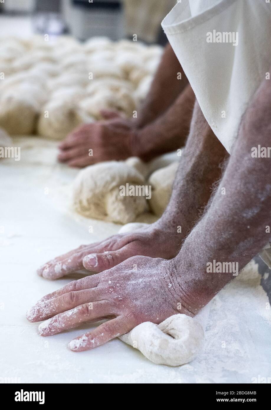 Bakers at work in Borba, Alentejo region, Portugal Stock Photo