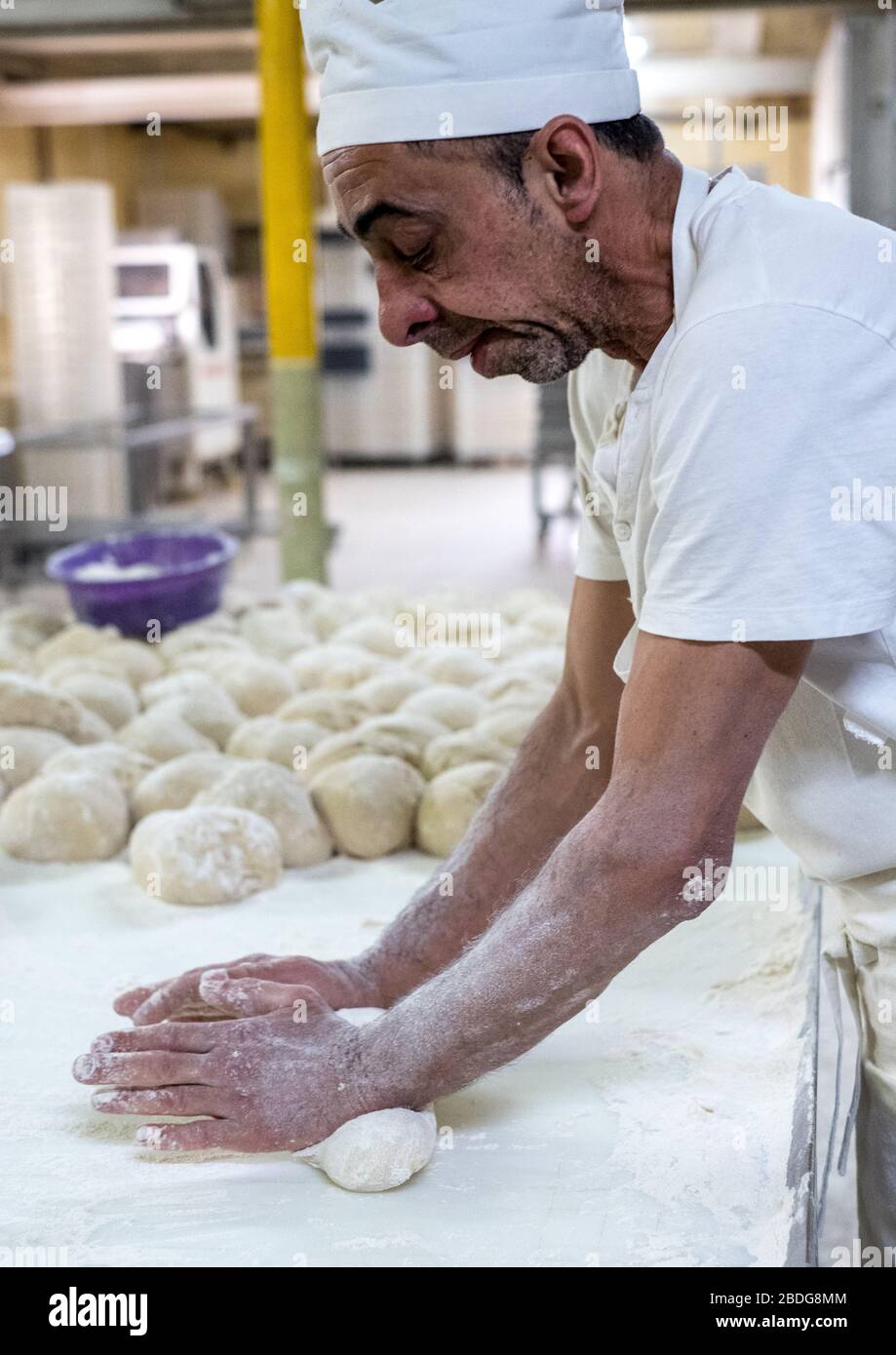 Baker at work in Borba, Alentejo region, Portugal Stock Photo