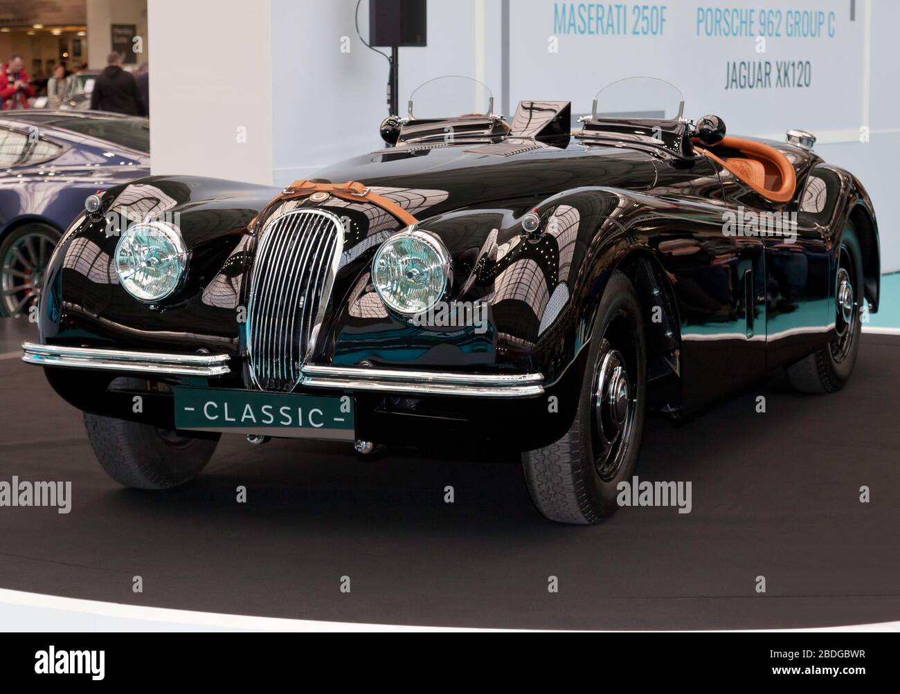 Three-quarters front view of David Gandy's restored 1954, Jaguar XK120, on display at the 2020 London Classic Car Show Stock Photo