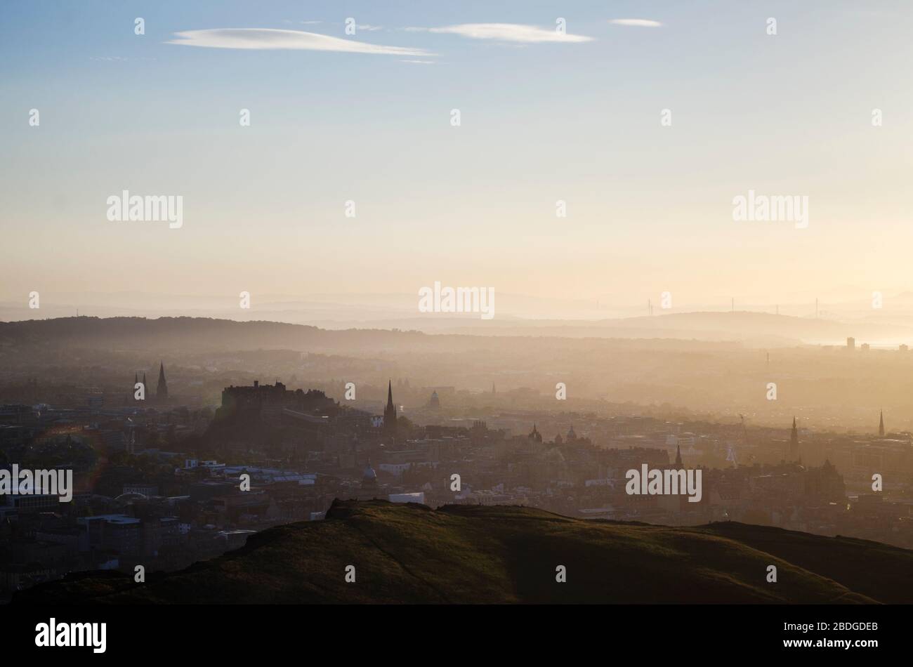 Hazy Sunset Over Edinburgh City Stock Photo