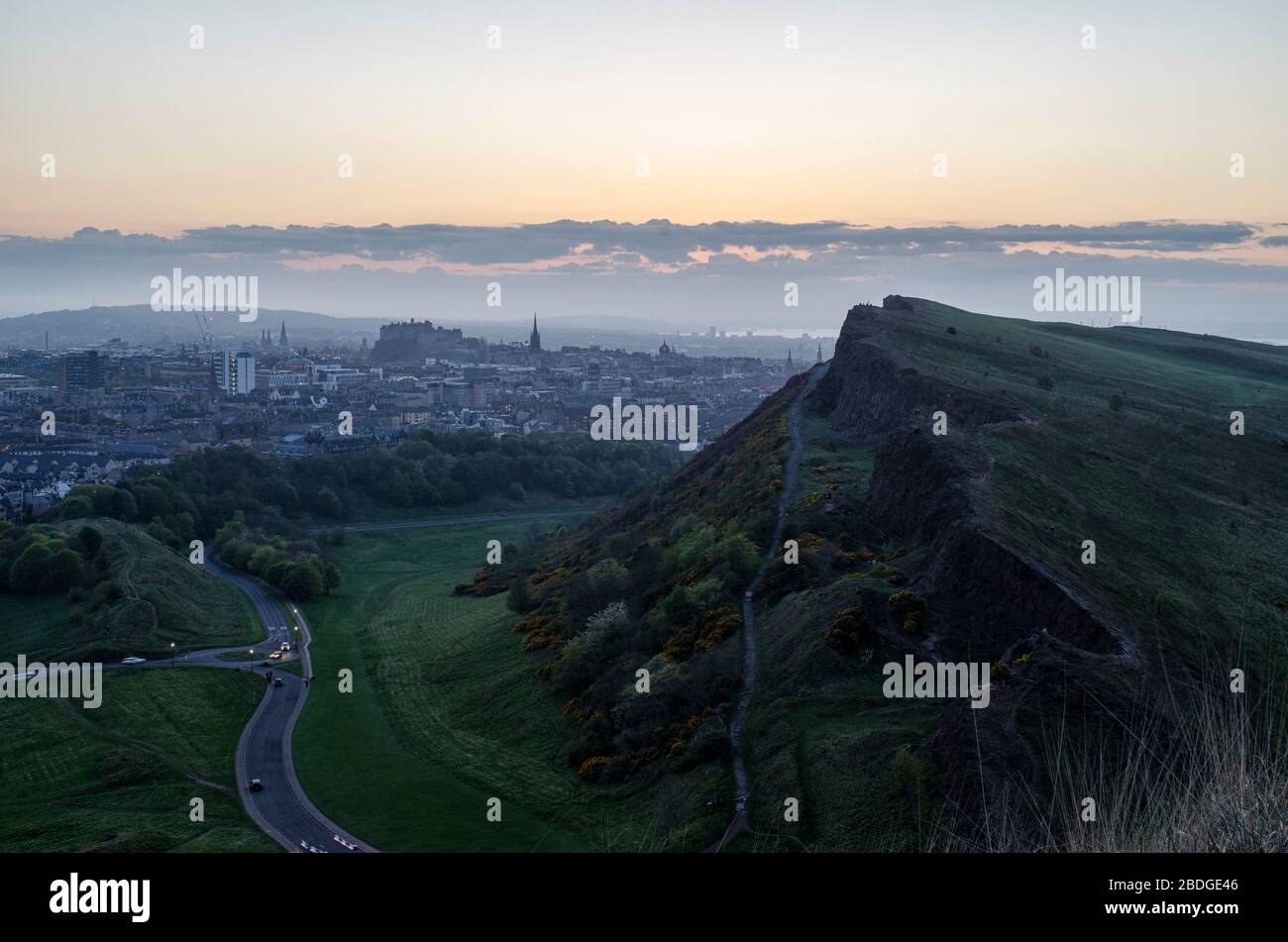 Hazy Sunset Over Edinburgh City Stock Photo