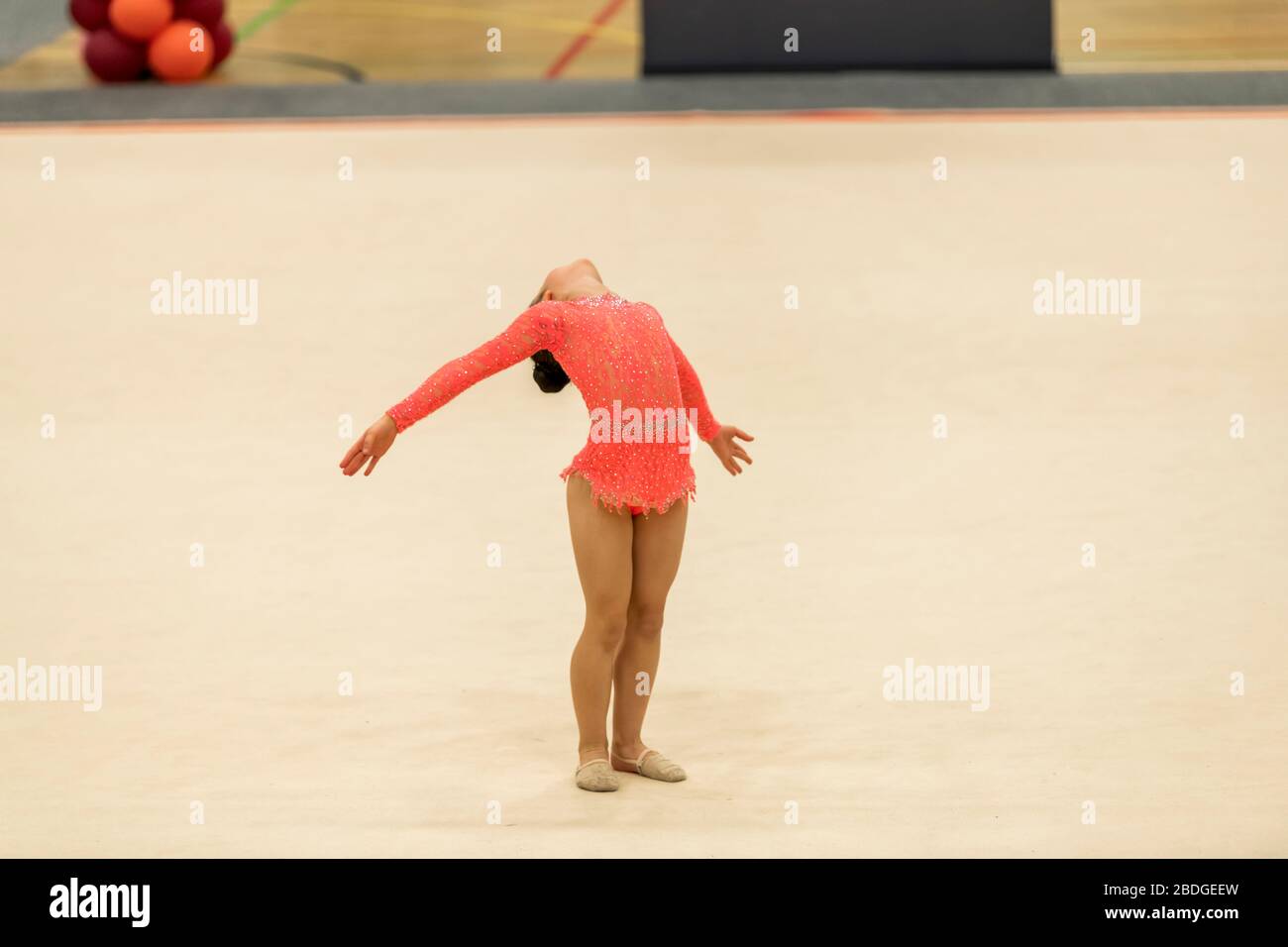 Portrait of a young gymnast. Portrait of a 7 years old girl in rhythmic gymnastics competitions Stock Photo
