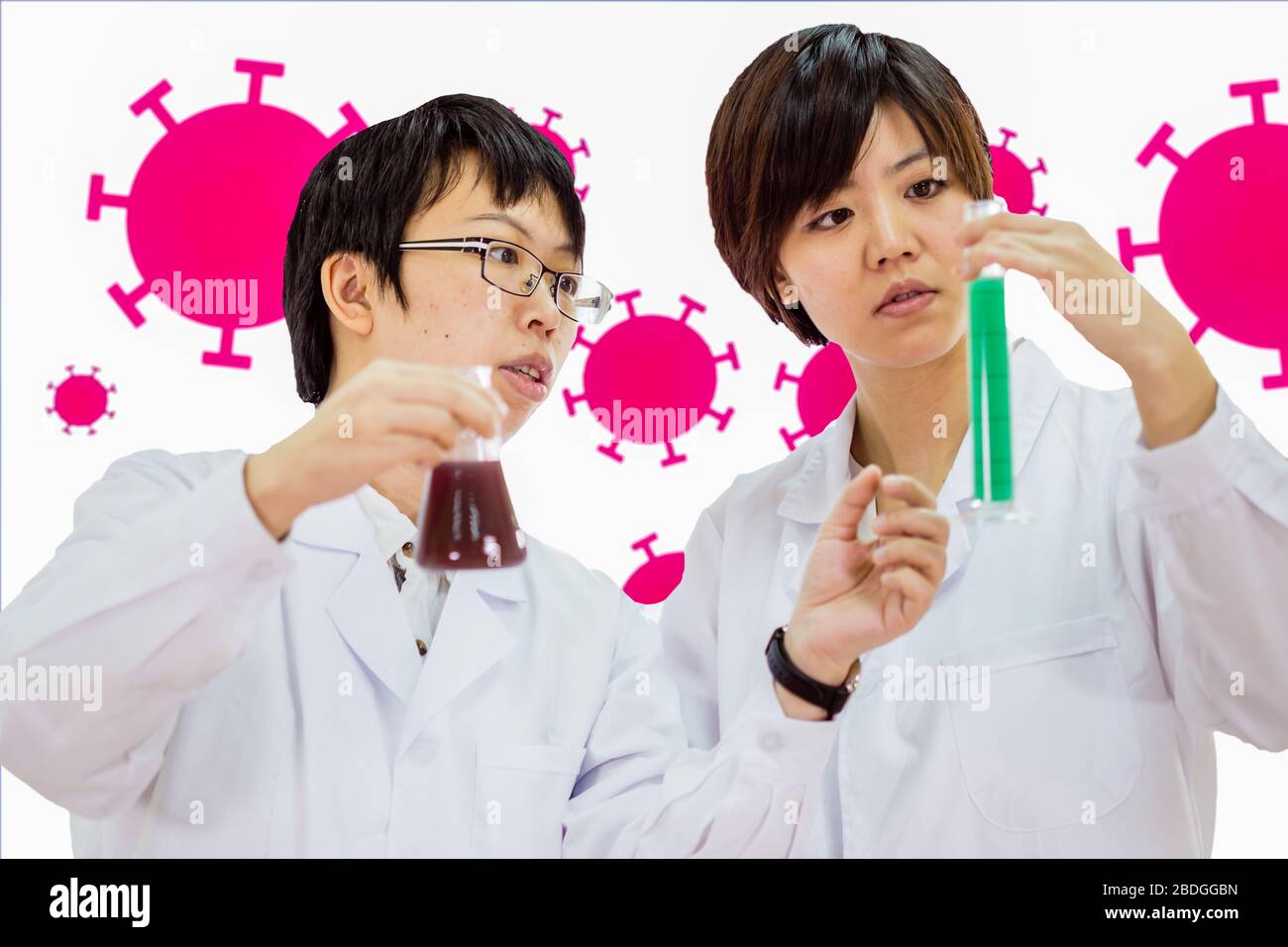 Asian American scientists inspecting flasks with coronavirus background Stock Photo