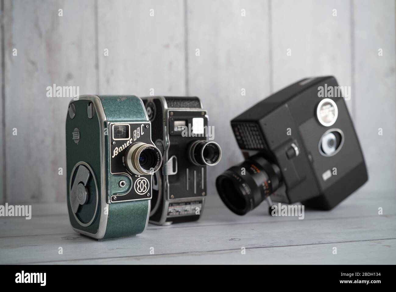 Old 35mm film canisters and vintage 8mm cine / movie cameras still