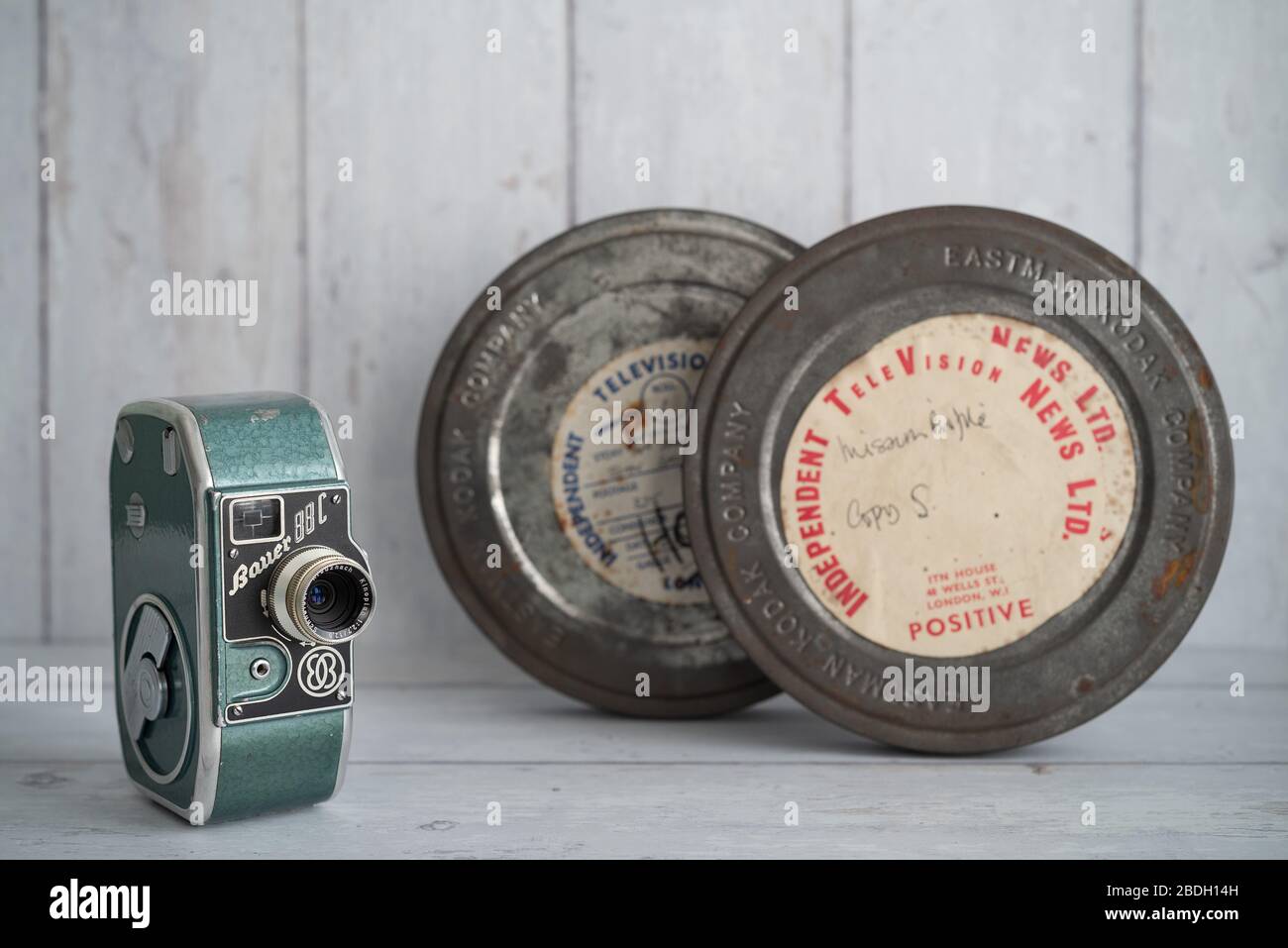 Old 35mm film canisters and vintage 8mm cine / movie cameras still