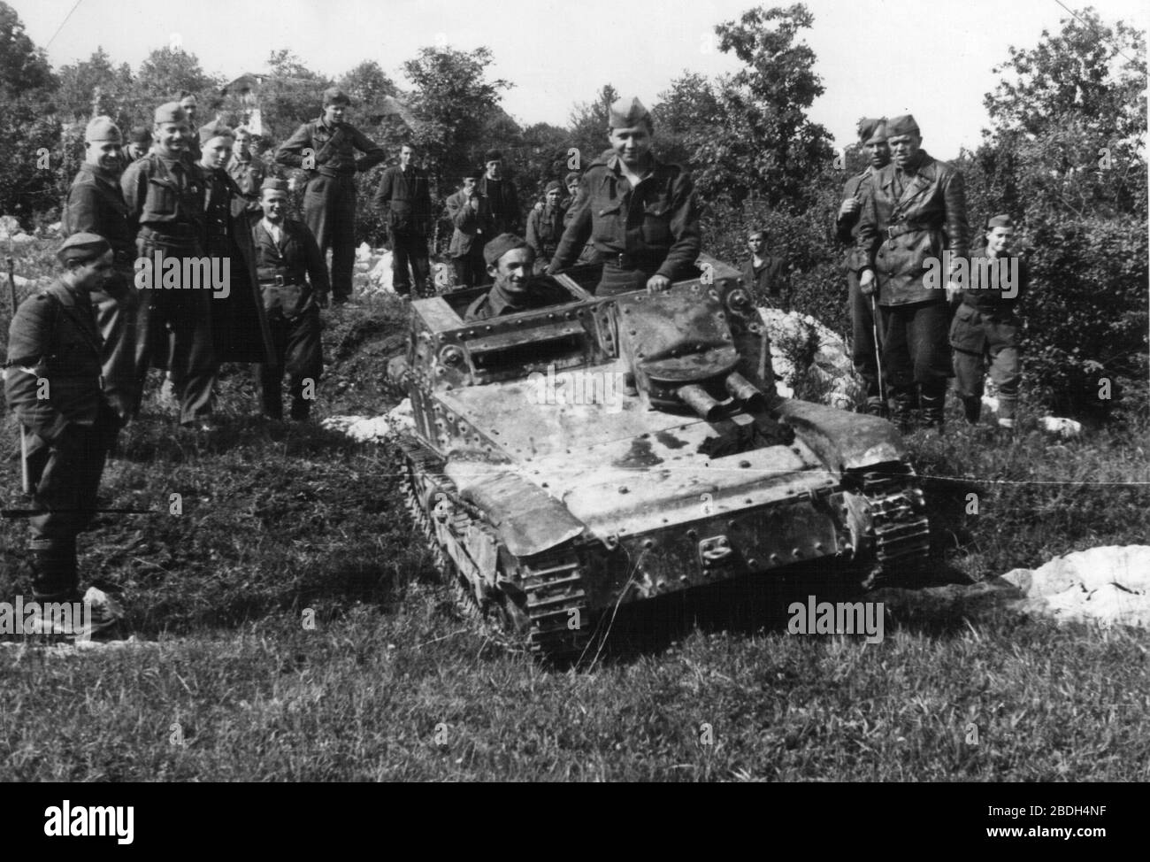 'Slovenščina: Trening partizanskih tankistov med Stransko vasjo in Semičem; 1944; This image is available from the Digital Library of Slovenia under the reference number XIHW6SUI  This tag does not indicate the copyright status of the attached work. A normal copyright tag is still required. See Commons:Licensing for more information. Deutsch | English | español | italiano | македонски | polski | português | slovenščina | +/−; Tomo Kopinič; ' Stock Photo