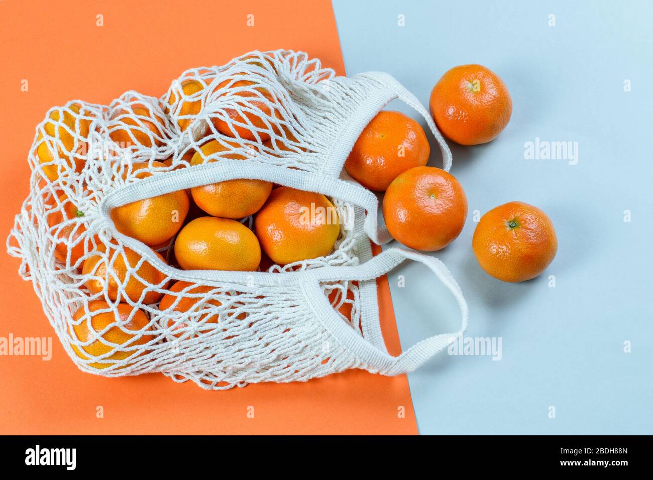Fresh tangerines in a netted bag, Stock image