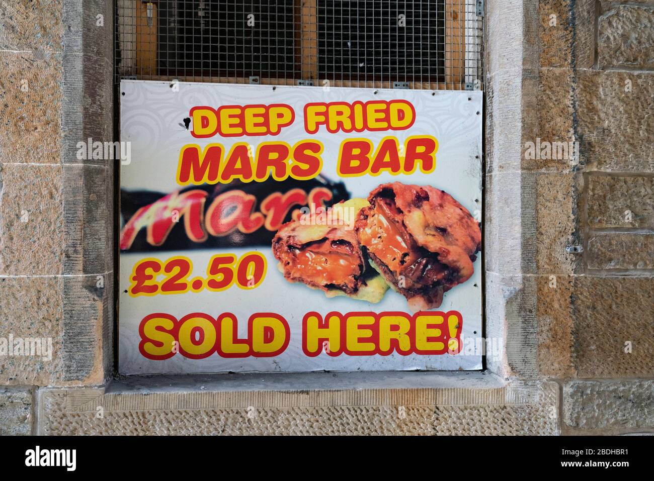 Sign outside takeaway food shop offering deep fried mars bars in Edinburgh, Scotland, UK Stock