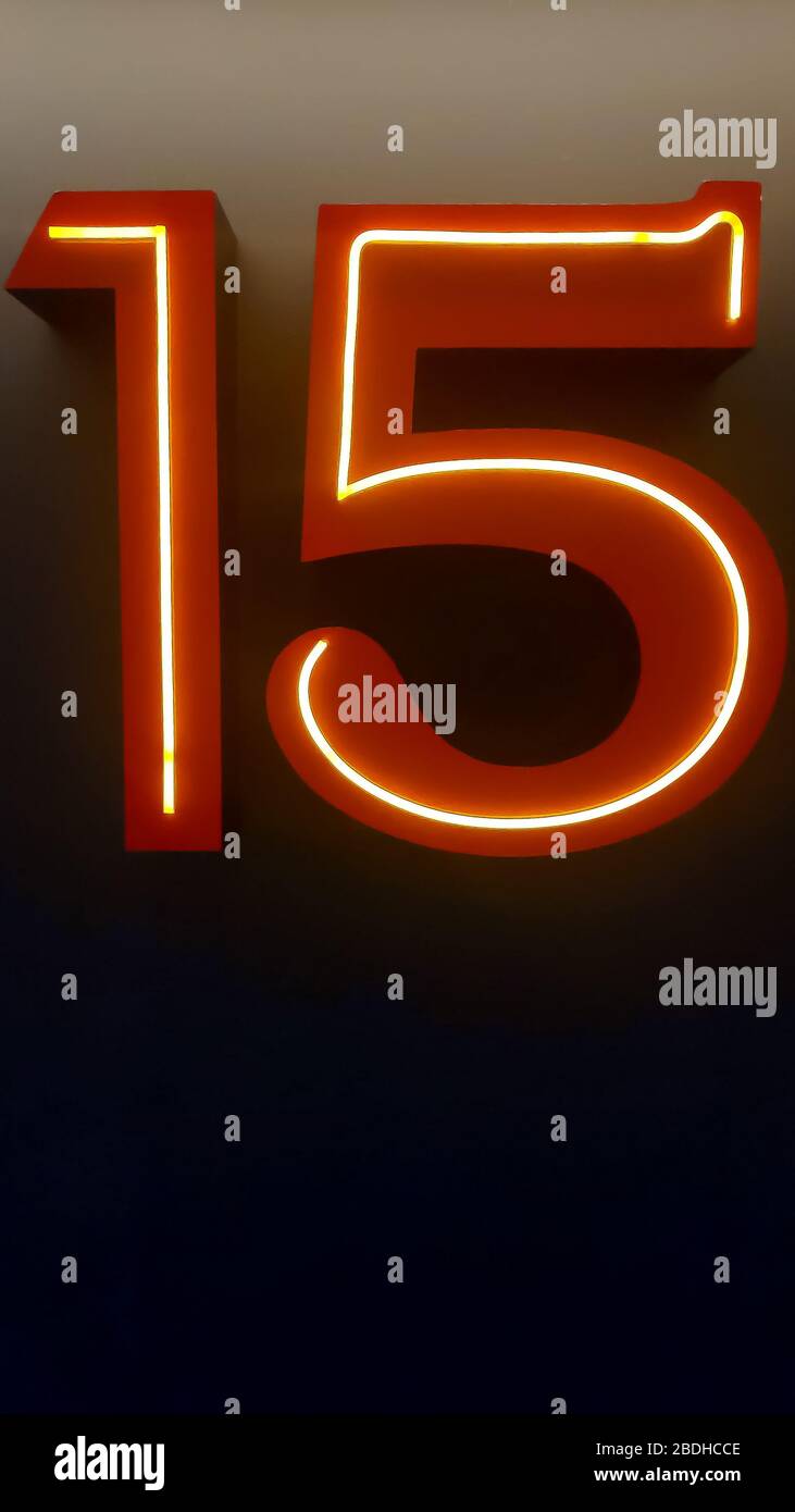 Number fifteen with lights on and clear - fifteen years - fifteen  illuminated - large and clear number against dark background Stock Photo -  Alamy, image size:731x1390