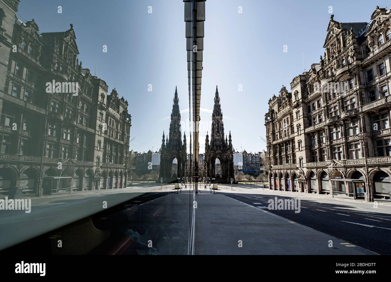 Images from Edinburgh during the continuing Coronavirus lockdown. Pictured; View of Scott monument from deserted South St David Street in city centre. Stock Photo