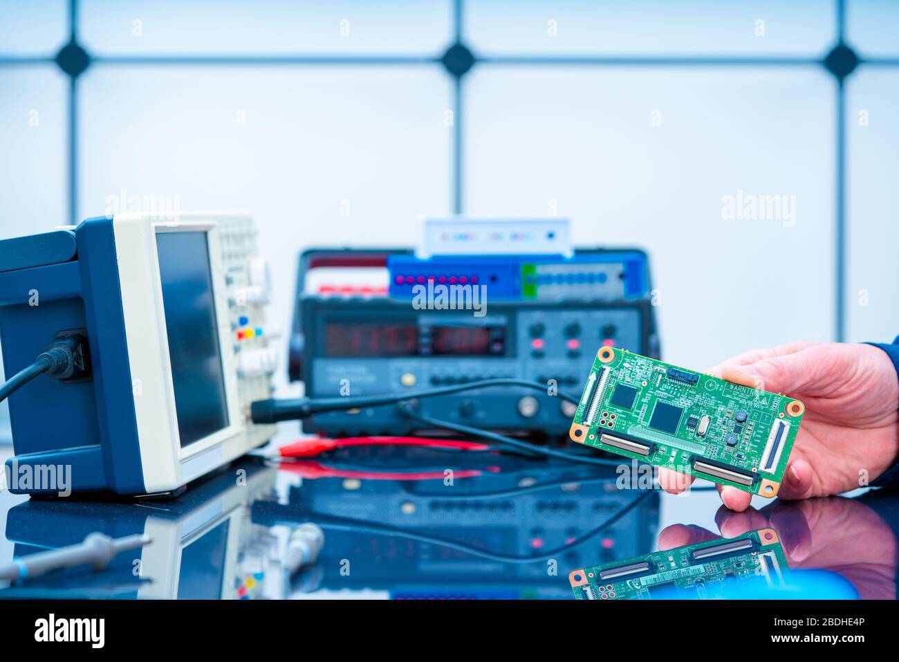 Debugging electronics device. PCB witch microcontroller in electronics ...